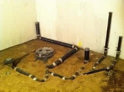 HOW TO LAY OUT A WATER LINE THROUGH A BASEMENT WALL